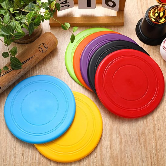 frisbee disque volant orange bleu jaune rouge violet vert noir